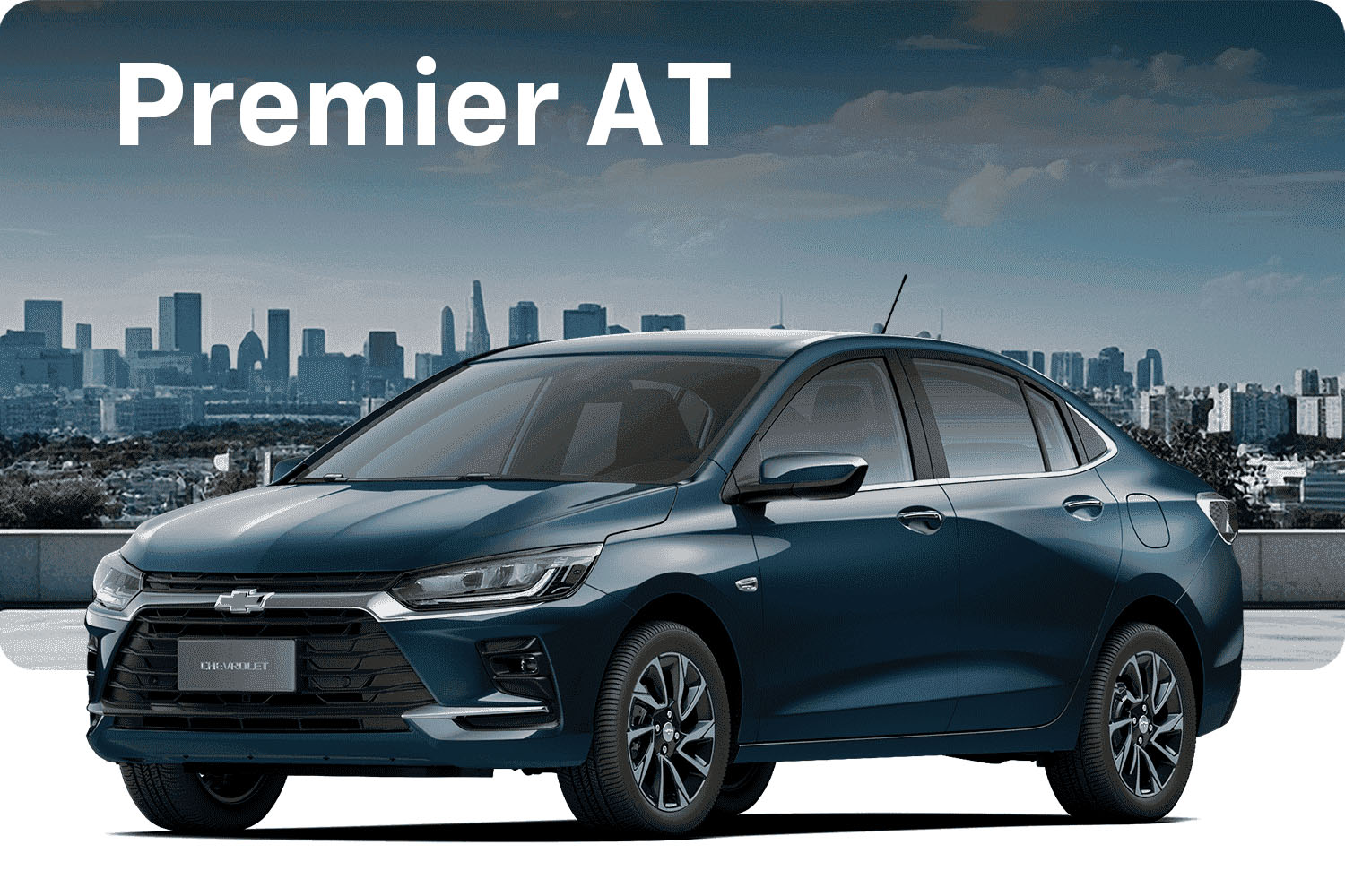 Onix Sedán Premier 2026 color azul frente a ciudad